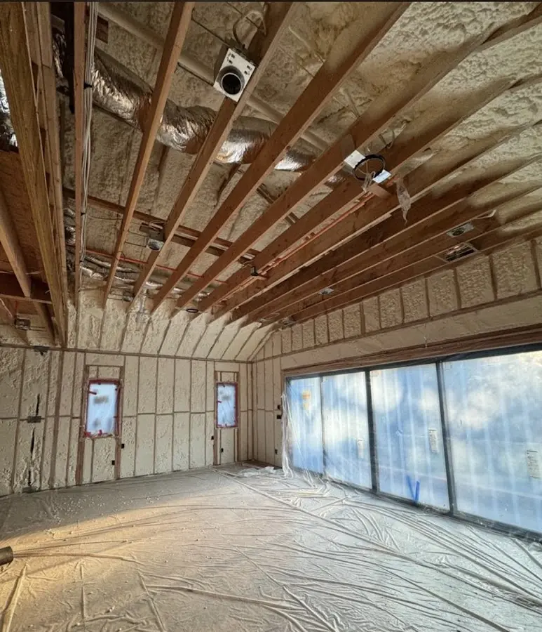 Interior walls and ceiling insulated with spray foam during new construction in Chester